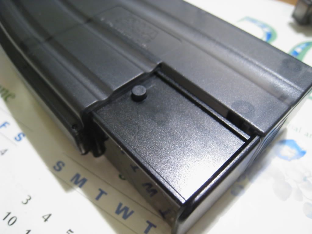 http://i8.photobucket.com/albums/a1/aznriptide859/Airsoft/KWA Magazine Speed Loader/IMG_1382.jpg